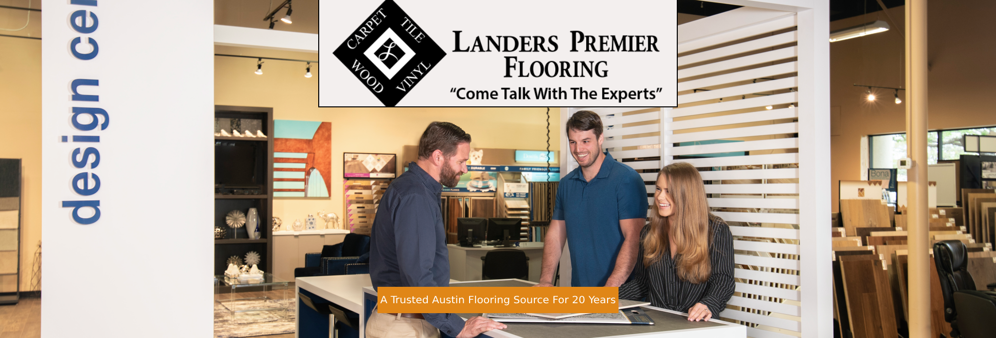 Landers Premier Flooring - Main Consultation Desk With Three People seated around it.